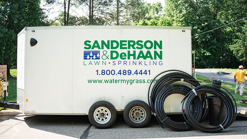 Schedule a Site Visit and Consultation-2 Estimator quoting a sprinkler installation