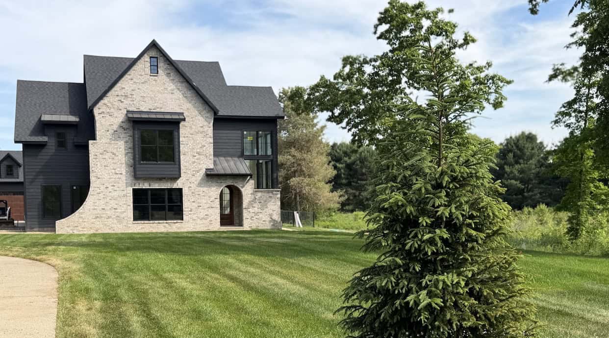 Beautiful green lawn after professional sprinkler system installation by Sanderson & DeHaan in Grand Rapids, Michigan.
